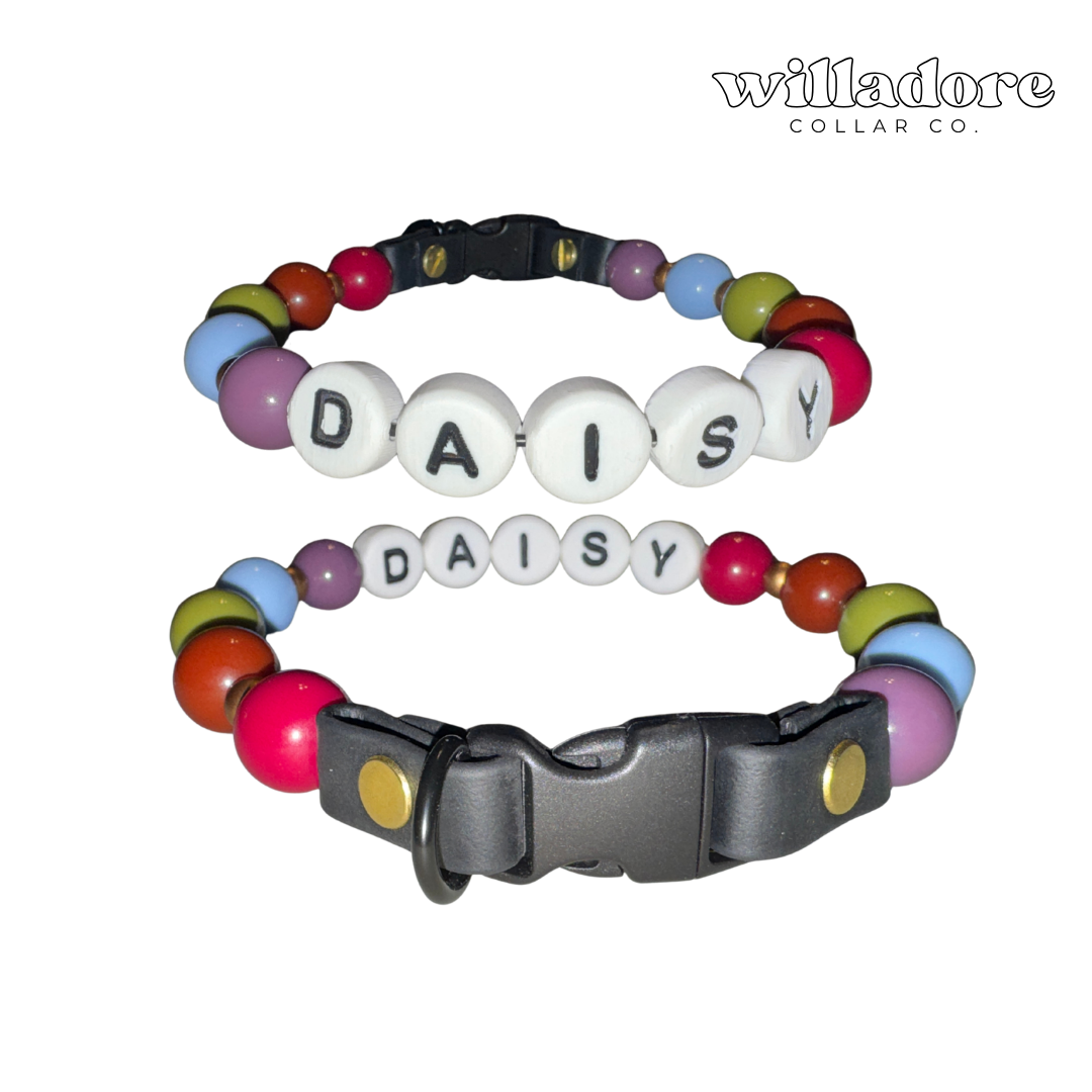 Two personalized dog collars from Willadore Collar Co. on a white background.