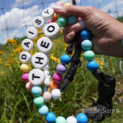 Custom beaded dog collar with personalized name beads in colorful handmade design by Willadore.