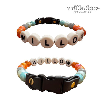 Custom beaded dog collar with multicolor beads and WILLOW name letters, highlighting Willadore Collar Co.’s personalized handmade dog collars.