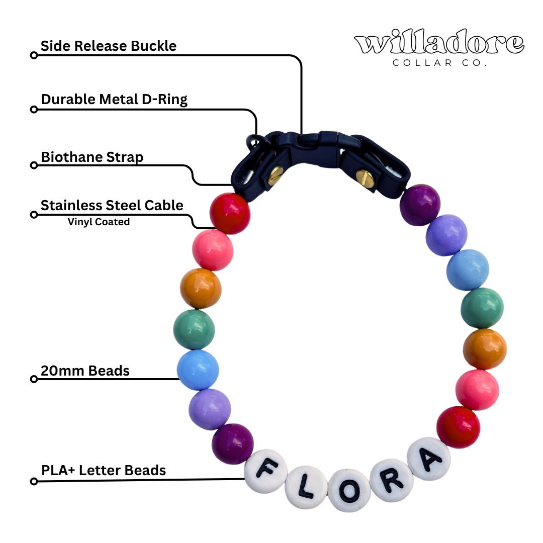 Custom beaded Biothane dog collar with multicolor beads and FLORA name letters, highlighting Willadore Collar Co.’s durable handmade dog collars.”