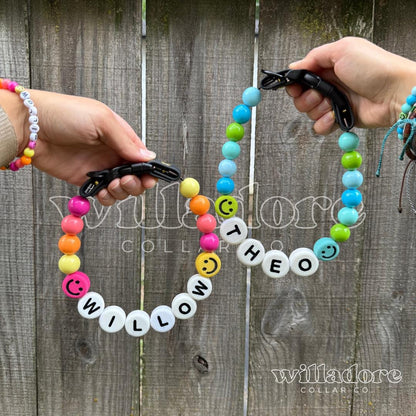 Colorful custom beaded pet collars with WILLOW and THEO name beads, personalized handmade dog collars by Willadore Collar Co.