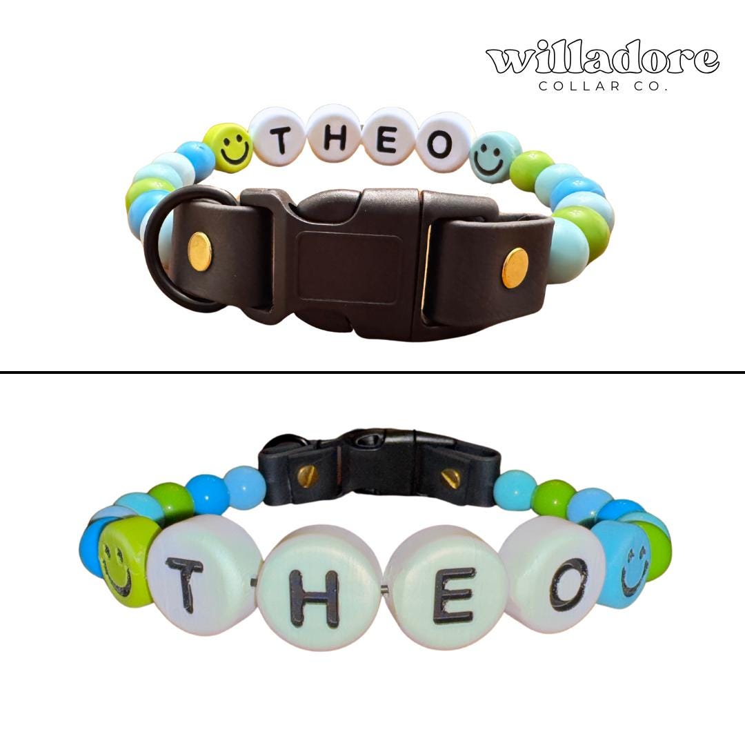 Custom beaded dog collar with blue, green, and yellow beads, smiley face accents, and THEO name letters, personalized handmade pet collar by Willadore Collar Co